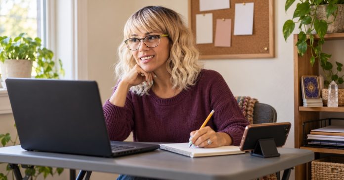 Woman planning useful website content at a modest home workspace