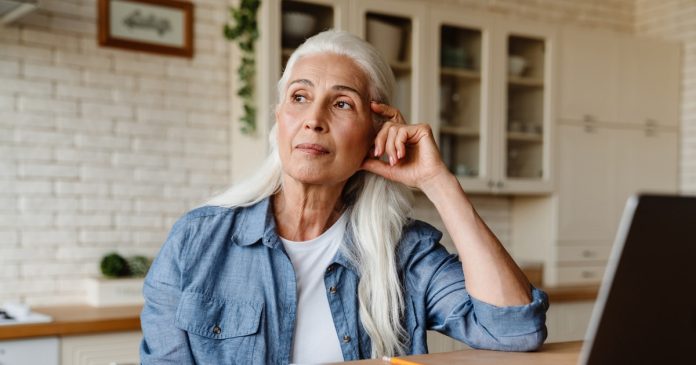 Does Your Ex Miss You? Feelings, Contact and Reconciliation Thoughtful woman pausing beside her laptop and notebook at home