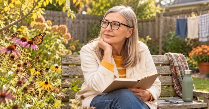 Woman enjoying a quiet moment alone on a small garden bench
